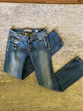 BKE Women’s Mid Wash Skinny Jeans with Distressing